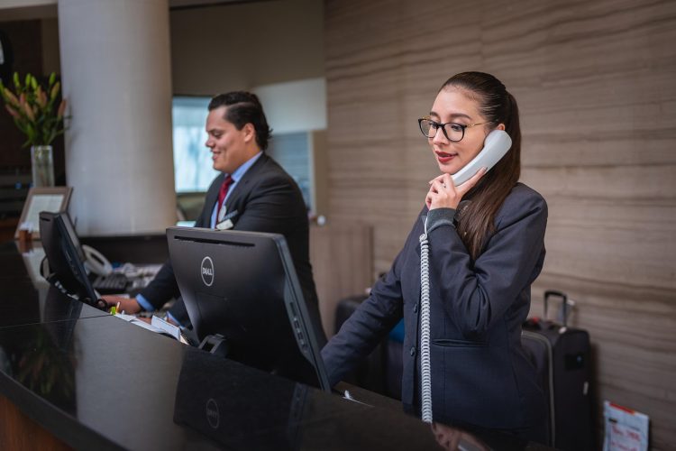 Receptionists, phone call, hotel — Essential Support: Unveiling the General Worker Job Description